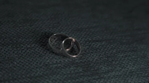 Wedding rings and play with light Stock Footage 129094032