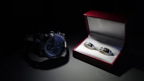 Wedding rings and watch Stock-Footage 220137813