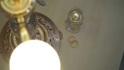Wedding rings are on the table Stock Footage 163567118