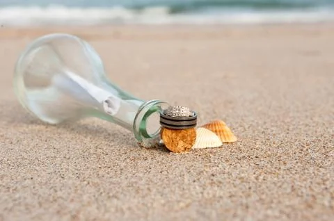 Wedding rings on the beach Stock Photos