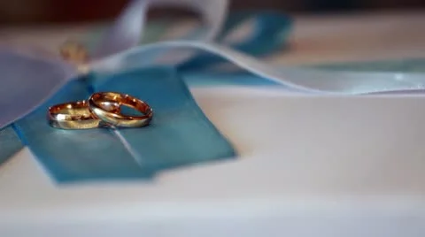 Wedding rings in a beam of light Stock Footage 12538321