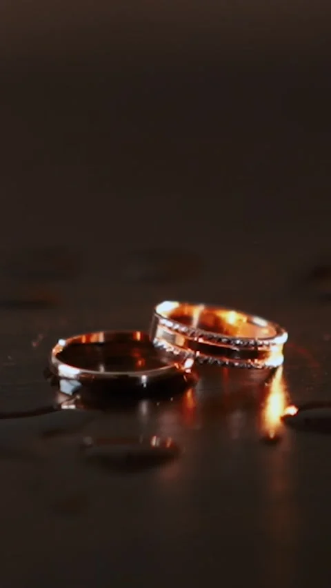 Wedding rings close-up lie on the table during the wedding celebration Stock Footage 252267881