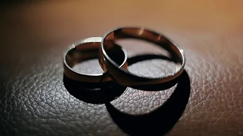 Wedding rings in the dark Stock-Footage 74972073