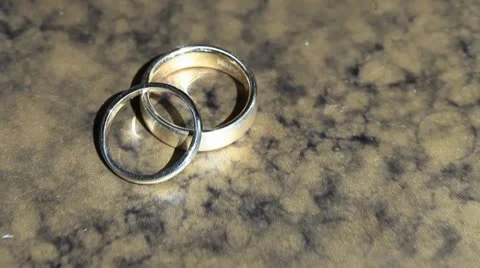 Wedding Rings Dolly out of focus Stock Footage 20568320