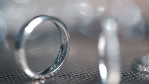 Wedding Rings Engraved With Date, Shining With Light. Close Up Macro. Stock Footage 198347510