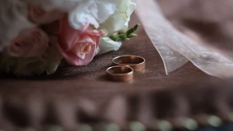 Wedding rings Stock Footage 82939376