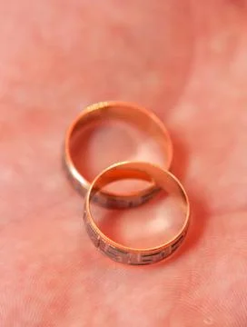 Wedding rings in hand Stock Photos
