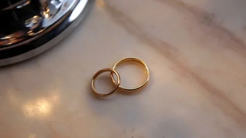 Wedding rings with lights effect Stock Footage 101748416