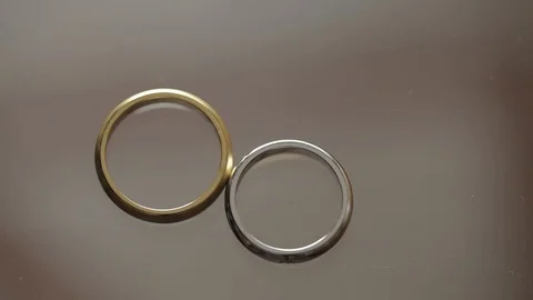 Wedding Rings macro closeup gold and silver diamon Jewellery Video stock 93713747