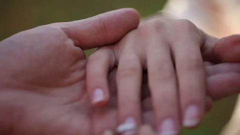Wedding Rings macro closeup Putting the ring on your finger white gold diamon Stock Footage 93714484