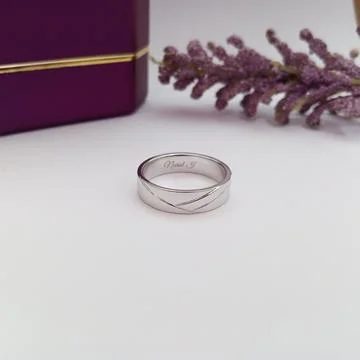 Wedding rings. Macro photo of the product with purple ringbox Stock Photos