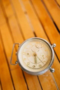 Wedding rings on old mechanical clock 스톡 사진