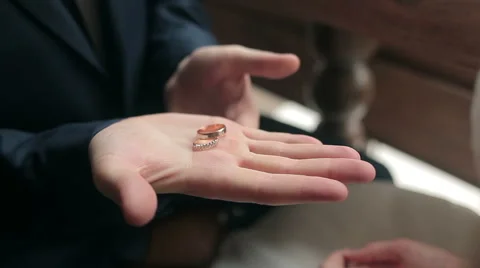 Wedding rings on the palm Stock Footage 40470464