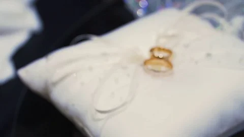 Wedding rings on pillow Stock Footage 80624559