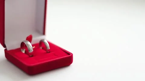 Wedding rings in a red box 動画素材 64641379