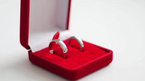 Wedding rings in a red box 動画素材 64641393