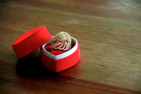 Wedding rings in a red box Stock Photos