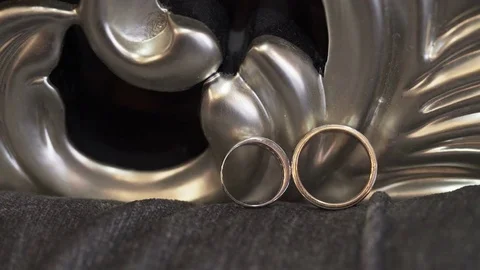 Wedding rings in room Stock Footage 69793173
