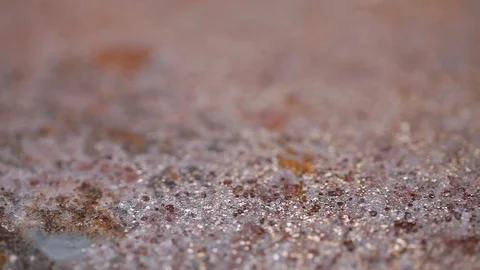 Wedding Rings on rusty metal macro closeup gold and silver diamon Jewellery in Stock Footage 114493691