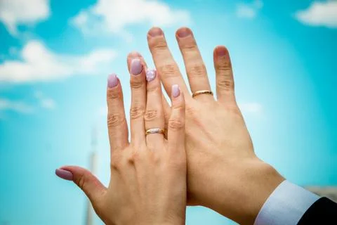 Wedding rings, sky Stock Photos