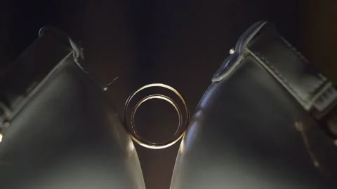 Wedding rings sprinkled with perfume. Macro. Stock Footage 131339079