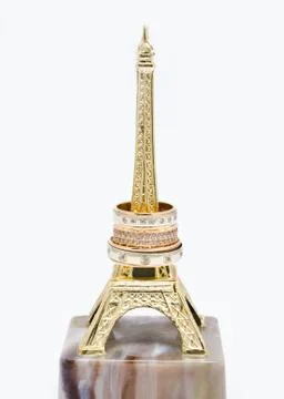 Wedding rings on the statue Eiffel Tower Stock Photos
