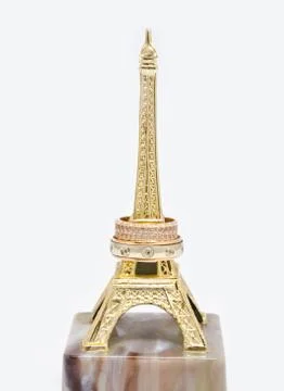 Wedding rings on the statue Eiffel Tower Stock Photos