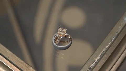 Wedding Rings on Table Stock Footage 108064946