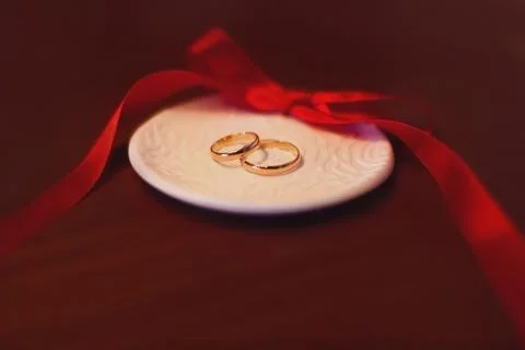 Wedding rings on the table Stock Photos