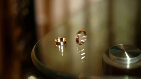 Wedding rings in a whirling dance Stock Footage 73109382