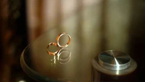 Wedding rings in a whirling dance Video stock 73109504