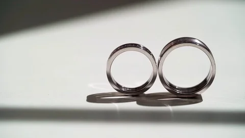 Wedding rings at white background Stock Footage 109620131