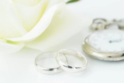 Wedding rings on white background Stock Photos