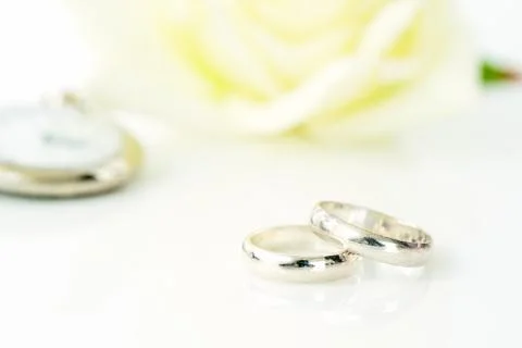 Wedding rings on white background Stock Photos
