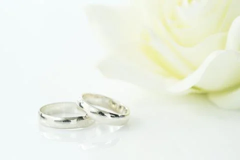 Wedding rings on white background Stock Photos