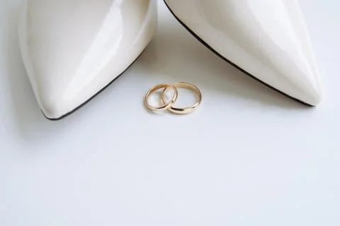 Wedding rings on a white background Stock Photos