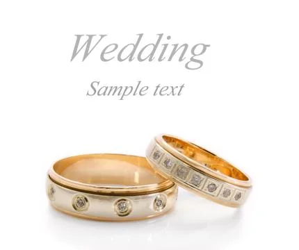 Wedding rings on a white Stock Photos