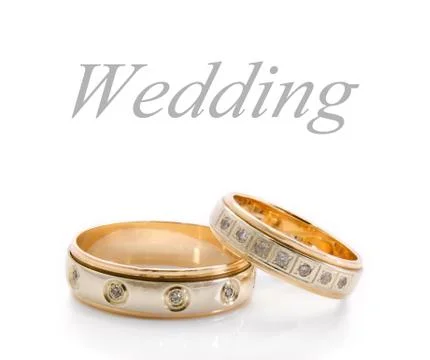 Wedding rings on a white Stock Photos