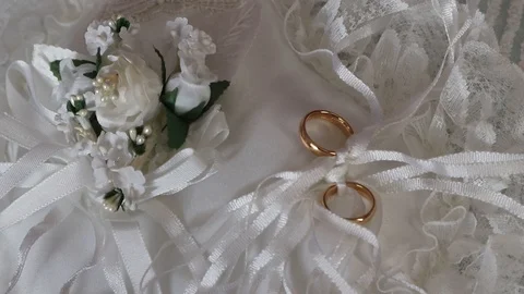 Wedding rings on white pillow, close up, ready for wedding Stock Footage 120747005