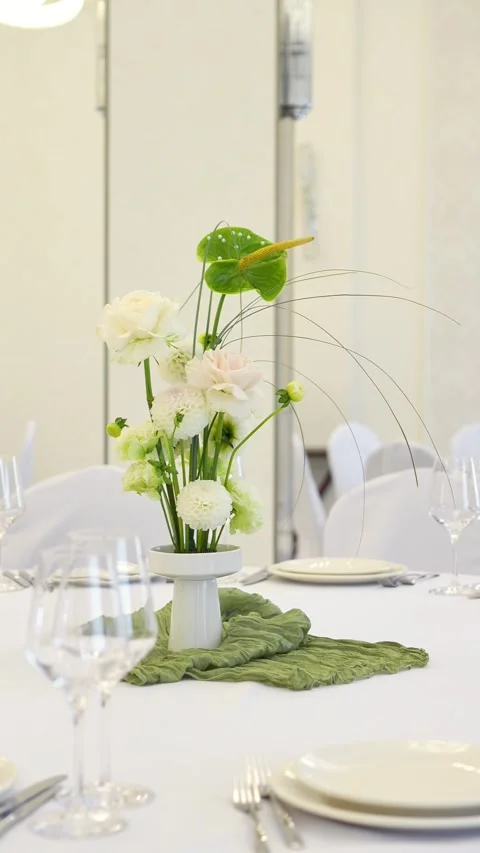 Wedding romantic composition for wedding table decoration in white and green col Stock Footage 318932225