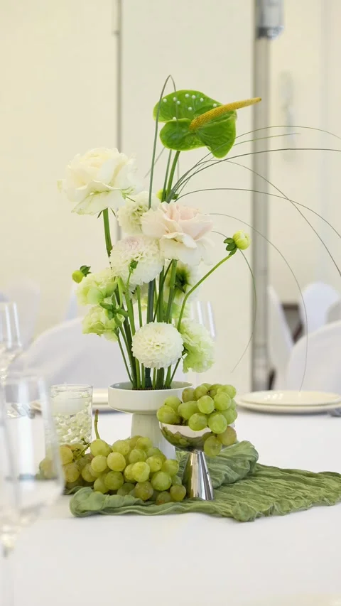 Wedding romantic composition for wedding table decoration in white and green col Stock Footage 318932236