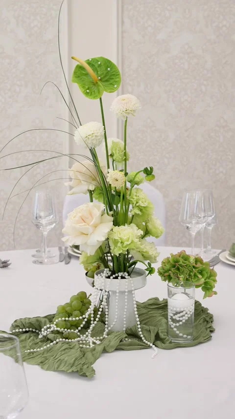 Wedding romantic composition for wedding table decoration in white and green col Stock Footage 318932448