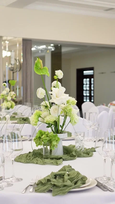 Wedding romantic composition for wedding table decoration in white and green col Stock Footage 318932454
