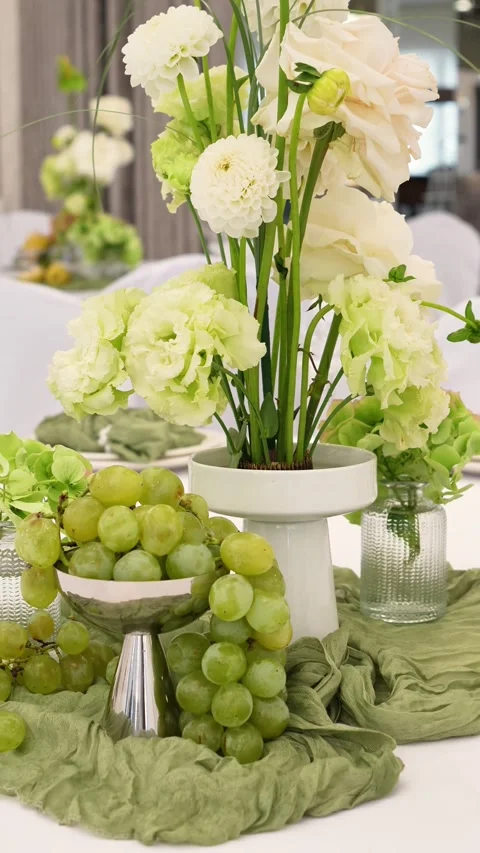 Wedding romantic composition for wedding table decoration in white and green col Stock Footage 318932480