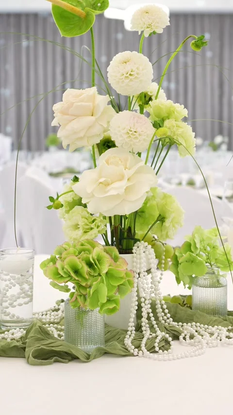 Wedding romantic composition for wedding table decoration in white and green col Stock Footage 318932512