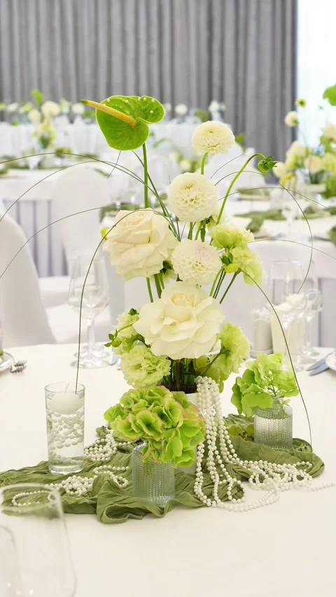 Wedding romantic composition for wedding table decoration in white and green col Stock Footage 318932526