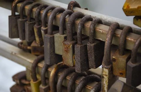 Wedding set of locks, different types. Set of rusty locks on the bridge Stock Photos