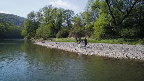 Wedding shoot/ Flight over the river Stock Footage 75600034