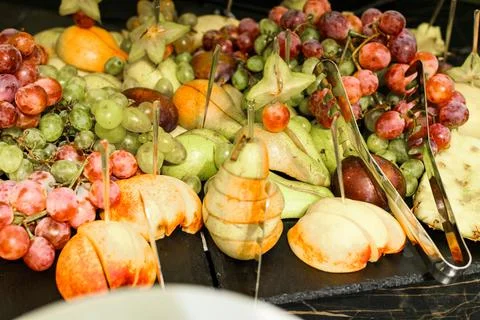 Wedding snacks at the candy bar, sweets and fruit. 스톡 사진