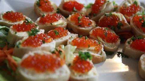 Wedding snacks. Wedding buffet. Red caviar. Canapes. Video stock 138315890